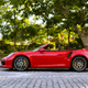 Illustration for article titled The 2018 Porsche 911 Turbo S Cabriolet Is the Best Way to Kill Hypercars and Get a Tan